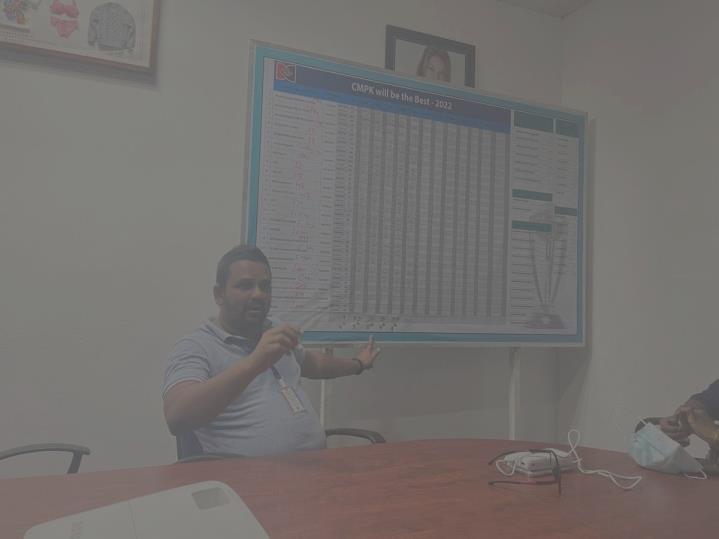 Supervisors and engineers in a KPI review session